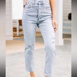 Vintage Calvin Klein high waisted straight leg light wash jeans.